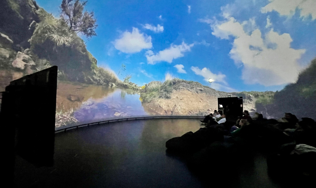 people watching film in the dome theatre